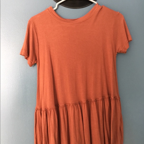 burnt orange peplum top